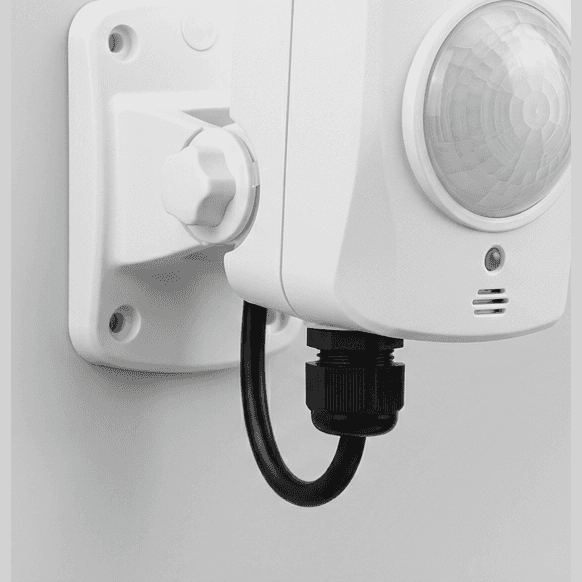 Photorealistic wall-mounted PIR motion sensor with fresnel lens